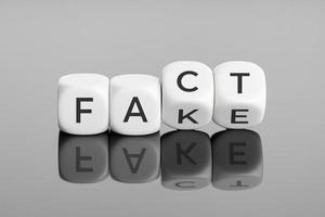 Fact or Fake concept. Flip blocks change the word fake to fact. April fools day photo