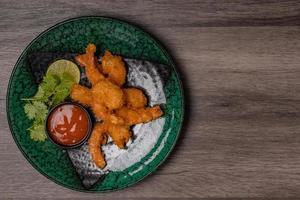 Battered Prawns with Copy Space Chili Sauce photo