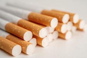 Cigarette, tobacco in roll paper with filter tube, No smoking concept. photo