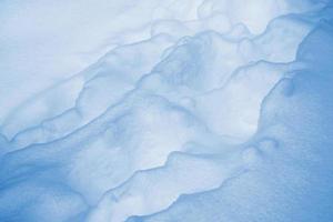 antecedentes. paisaje de invierno la textura de la nieve foto