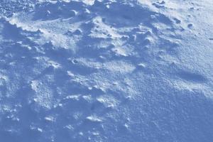 antecedentes. paisaje de invierno la textura de la nieve foto