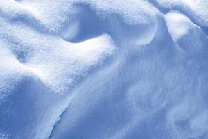 antecedentes. paisaje de invierno la textura de la nieve foto