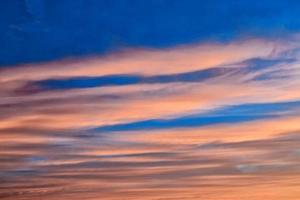 Blurred background. Bright sky with fluffy clouds. photo