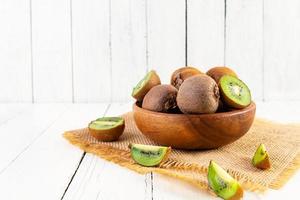 Juicy fresh kiwi fruit isolated on white background. Sliced kiwi photo