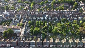 Aerial footage and high angle view of Train on Tracks at Central Luton Railway Station and City Centre of Luton Town of England UK video