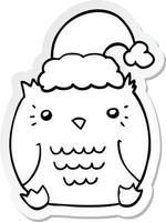 sticker of a cute cartoon owl wearing christmas hat vector