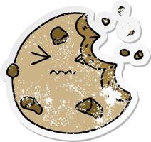 distressed sticker of a quirky hand drawn cartoon munched cookie vector