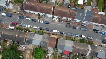 Aerial footage and high angle view of Train on Tracks at Central Luton Railway Station and City Centre of Luton Town of England UK video