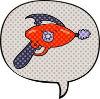 pistola de rayos de dibujos animados y burbuja de habla al estilo de las historietas vector
