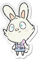 distressed sticker of a cartoon rabbit shrugging shoulders vector