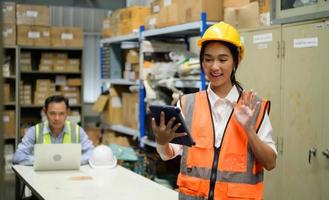 Warehouse Manager, Thinking and reviewing the preparation of products that must be distributed to retailers during the price increase in the market. photo