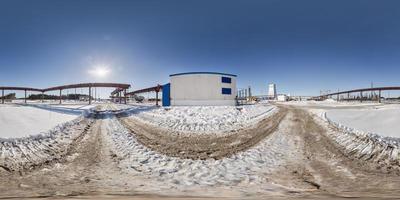 full seamless panorama 360 angle view in winter snow field place site construction of a mining plant in equirectangular equidistant spherical projection, VR content photo