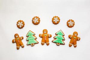 Handmade festive gingerbread cookies in the form of stars and Christmas trees and hearts for Valentine's Day photo