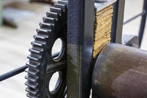 gears mechanism. details of old ancient machine for making engravings photo