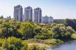 high-rise apartment buildings in the middle of the forest photo