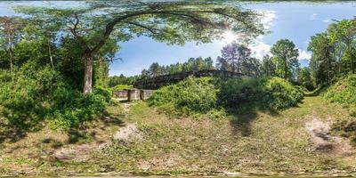 Full seamless 360 degrees angle  view panorama on the ruined abandoned military fortress of the First World War in forest in equirectangular spherical projection. Ready for VR AR content photo