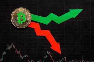 fluctuations  and forecasting of exchange rates of virtual money bitcoin. Red and green arrows with golden Bitcoin ladder on black paper forex chart background. Cryptocurrency concept. photo