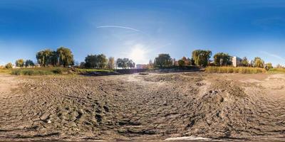 full seamless spherical panorama 360 degrees angle view at the bottom of dried up pond in garden of residential area in equirectangular projection, ready VR AR virtual reality content photo