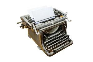 old vintage dust-covered typewriter with sheet of paper isolated on white background photo