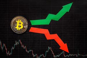 fluctuations  and forecasting of exchange rates of virtual money bitcoin. Red and green arrows with golden Bitcoin ladder on black paper forex chart background. Cryptocurrency concept. photo