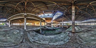 Full spherical seamless hdri panorama 360 degrees angle view concrete structures stairs abandoned unfinished building of airport. 360 panorama in equirectangular equidistant projection, VR AR content photo