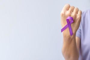 purple Ribbon for Violence, Pancreatic, Esophageal, Testicular cancer, Alzheimer, epilepsy, lupus, Sarcoidosis and Fibromyalgia. Awareness month and World cancer day concept photo