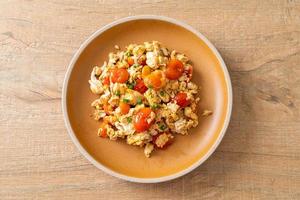stir-fried tomatoes with egg on plate photo