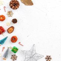 Top view of Christmas holiday background. Composition of festive ornament decor flatlay. photo