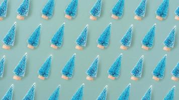 Top view of Christmas holiday pattern background. Composition of festive Christmas tree flatlay. photo
