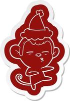 cartoon  sticker of a suspicious monkey wearing santa hat vector