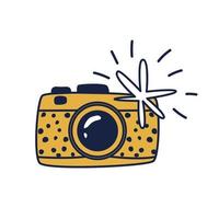 Yellow doodle camera. Hand-drawn cartoon camera with flash. Vector stock illustration of an apparatus for shooting isolated on a white background.