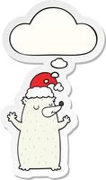 cute cartoon christmas bear and thought bubble as a printed sticker vector
