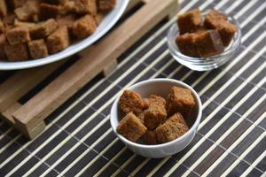 Spicy and spiced breadcrumbs on a white plate close-up. photo