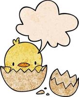 cute cartoon chick hatching from egg and speech bubble in retro texture style vector