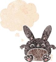 cartoon rabbit and thought bubble in retro textured style vector