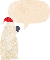 cartoon bear wearing christmas hat and speech bubble in retro textured style vector