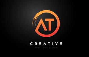 Orange AT Circular Letter Logo with Circle Brush Design and Black Background. vector