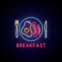 Neon breakfast sign. Fried egg and bacon on a plate. vector