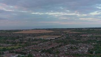 Aerial footage and high angle view of Train on Tracks at Central Luton Railway Station and City Centre of Luton Town of England UK video