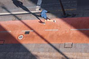 Bilbao, Vizcaya, Spain, 2022 - man running on the street in Bilbao city, Basque country, Spain photo