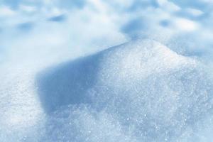 antecedentes. paisaje de invierno la textura de la nieve foto