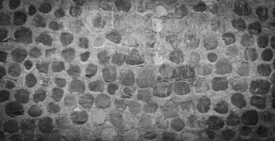 stone wall black for design background or wallpaper photo