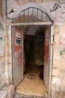 A door is an opening in a wall to enter and exit a building. photo