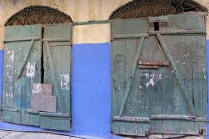 A door is an opening in a wall to enter and exit a building. photo