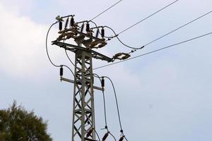 Electrical wires carrying high voltage current. photo