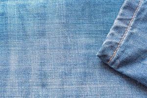 textura de fondo de los pantalones vaqueros azules foto