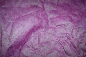 purple crumpled paper background photo