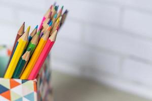 closeup of colorful pencils in pencil case photo