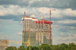 lift crane building a new residential building photo