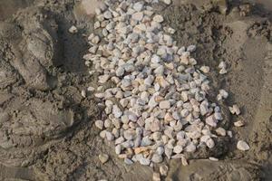 mixing concrete with gravel on construction cite photo